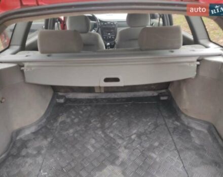 Красный Шевроле Лачетти, объемом двигателя 1.8 л и пробегом 380 тыс. км за 2999 $, фото 5 на Automoto.ua