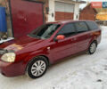 Красный Шевроле Лачетти, объемом двигателя 1.8 л и пробегом 219 тыс. км за 2699 $, фото 1 на Automoto.ua