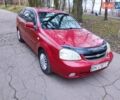 Красный Шевроле Лачетти, объемом двигателя 1.8 л и пробегом 380 тыс. км за 2999 $, фото 1 на Automoto.ua