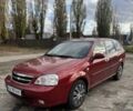 Красный Шевроле Лачетти, объемом двигателя 1.8 л и пробегом 264 тыс. км за 4500 $, фото 1 на Automoto.ua
