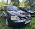 Красный Шевроле Лачетти, объемом двигателя 1.6 л и пробегом 290 тыс. км за 2900 $, фото 1 на Automoto.ua