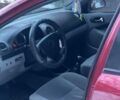 Красный Шевроле Лачетти, объемом двигателя 1.8 л и пробегом 220 тыс. км за 3250 $, фото 6 на Automoto.ua