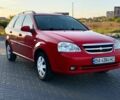 Красный Шевроле Лачетти, объемом двигателя 1.6 л и пробегом 296 тыс. км за 4014 $, фото 1 на Automoto.ua