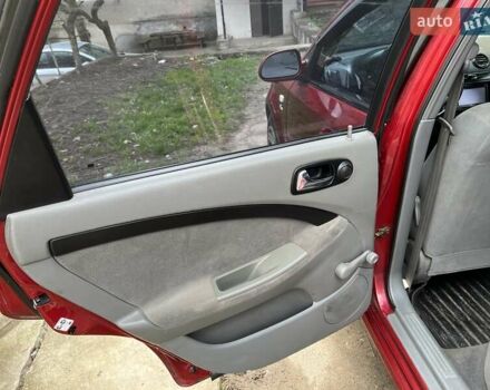 Красный Шевроле Лачетти, объемом двигателя 1.8 л и пробегом 251 тыс. км за 5500 $, фото 15 на Automoto.ua