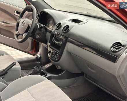 Червоний Шевроле Лачетті, об'ємом двигуна 1.8 л та пробігом 202 тис. км за 3500 $, фото 21 на Automoto.ua