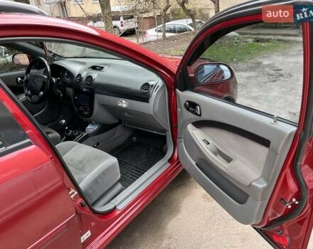 Красный Шевроле Лачетти, объемом двигателя 1.8 л и пробегом 251 тыс. км за 5500 $, фото 20 на Automoto.ua