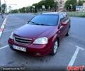 Красный Шевроле Лачетти, объемом двигателя 1.8 л и пробегом 280 тыс. км за 3900 $, фото 1 на Automoto.ua
