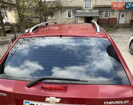 Красный Шевроле Лачетти, объемом двигателя 1.8 л и пробегом 251 тыс. км за 5500 $, фото 5 на Automoto.ua