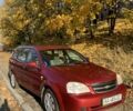 Красный Шевроле Лачетти, объемом двигателя 1.8 л и пробегом 179 тыс. км за 3900 $, фото 1 на Automoto.ua