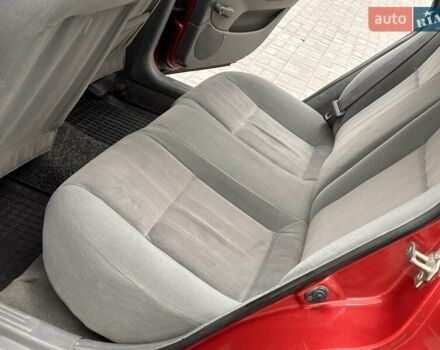 Красный Шевроле Лачетти, объемом двигателя 1.8 л и пробегом 220 тыс. км за 3300 $, фото 12 на Automoto.ua