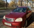 Красный Шевроле Лачетти, объемом двигателя 1.8 л и пробегом 179 тыс. км за 3900 $, фото 2 на Automoto.ua