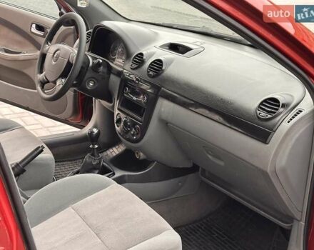 Красный Шевроле Лачетти, объемом двигателя 1.8 л и пробегом 220 тыс. км за 3300 $, фото 22 на Automoto.ua