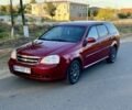 Красный Шевроле Лачетти, объемом двигателя 1.8 л и пробегом 152 тыс. км за 3463 $, фото 1 на Automoto.ua