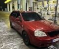 Красный Шевроле Лачетти, объемом двигателя 1.8 л и пробегом 420 тыс. км за 2000 $, фото 1 на Automoto.ua