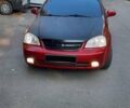 Красный Шевроле Лачетти, объемом двигателя 1.8 л и пробегом 210 тыс. км за 3850 $, фото 4 на Automoto.ua