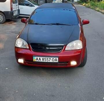 Красный Шевроле Лачетти, объемом двигателя 1.8 л и пробегом 210 тыс. км за 3850 $, фото 5 на Automoto.ua