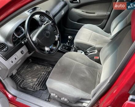 Красный Шевроле Лачетти, объемом двигателя 1.8 л и пробегом 251 тыс. км за 5500 $, фото 12 на Automoto.ua