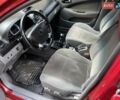 Красный Шевроле Лачетти, объемом двигателя 1.8 л и пробегом 251 тыс. км за 5500 $, фото 12 на Automoto.ua