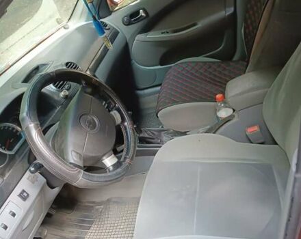 Красный Шевроле Лачетти, объемом двигателя 1.8 л и пробегом 170 тыс. км за 4100 $, фото 6 на Automoto.ua