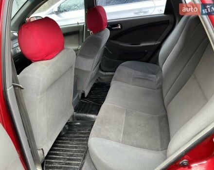 Красный Шевроле Лачетти, объемом двигателя 1.8 л и пробегом 251 тыс. км за 5500 $, фото 14 на Automoto.ua