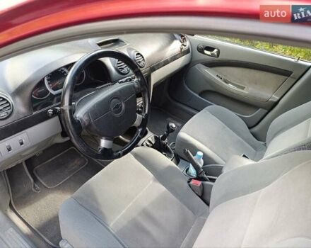 Красный Шевроле Лачетти, объемом двигателя 1.8 л и пробегом 173 тыс. км за 5300 $, фото 4 на Automoto.ua