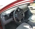 Красный Шевроле Лачетти, объемом двигателя 1.6 л и пробегом 168 тыс. км за 5500 $, фото 6 на Automoto.ua