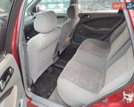 Красный Шевроле Лачетти, объемом двигателя 1.8 л и пробегом 280 тыс. км за 5100 $, фото 22 на Automoto.ua