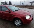 Красный Шевроле Лачетти, объемом двигателя 1.8 л и пробегом 235 тыс. км за 3900 $, фото 2 на Automoto.ua