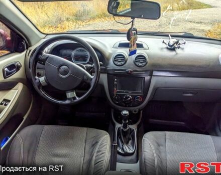 Красный Шевроле Лачетти, объемом двигателя 1.8 л и пробегом 177 тыс. км за 4800 $, фото 11 на Automoto.ua