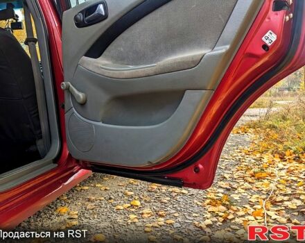 Красный Шевроле Лачетти, объемом двигателя 1.8 л и пробегом 177 тыс. км за 4800 $, фото 10 на Automoto.ua