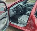 Красный Шевроле Лачетти, объемом двигателя 1.8 л и пробегом 235 тыс. км за 3900 $, фото 1 на Automoto.ua