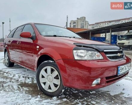Красный Шевроле Лачетти, объемом двигателя 1.8 л и пробегом 280 тыс. км за 5100 $, фото 11 на Automoto.ua