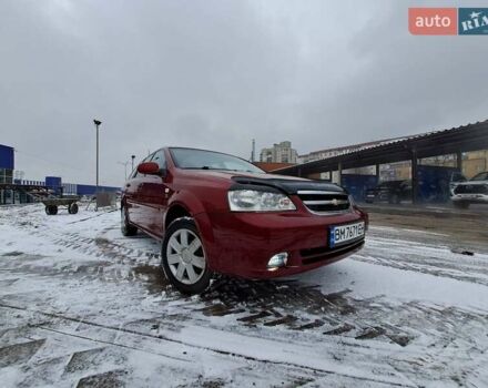 Красный Шевроле Лачетти, объемом двигателя 1.8 л и пробегом 280 тыс. км за 5100 $, фото 3 на Automoto.ua