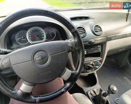 Красный Шевроле Лачетти, объемом двигателя 1.8 л и пробегом 173 тыс. км за 5300 $, фото 5 на Automoto.ua