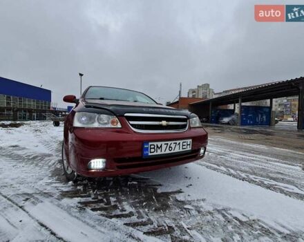 Красный Шевроле Лачетти, объемом двигателя 1.8 л и пробегом 280 тыс. км за 5100 $, фото 6 на Automoto.ua