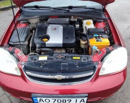 Красный Шевроле Лачетти, объемом двигателя 1.8 л и пробегом 235 тыс. км за 3900 $, фото 11 на Automoto.ua