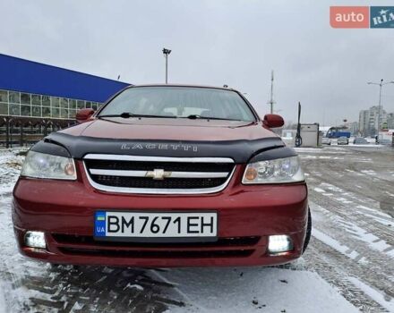 Красный Шевроле Лачетти, объемом двигателя 1.8 л и пробегом 280 тыс. км за 5100 $, фото 12 на Automoto.ua