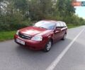 Красный Шевроле Лачетти, объемом двигателя 1.8 л и пробегом 173 тыс. км за 5300 $, фото 1 на Automoto.ua