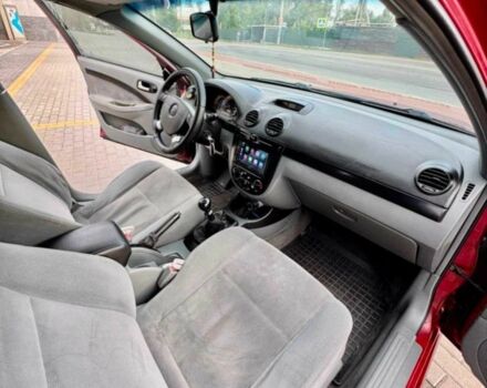 Красный Шевроле Лачетти, объемом двигателя 1.8 л и пробегом 269 тыс. км за 4200 $, фото 6 на Automoto.ua