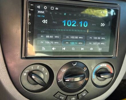 Красный Шевроле Лачетти, объемом двигателя 1.8 л и пробегом 107 тыс. км за 5400 $, фото 14 на Automoto.ua