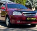 Красный Шевроле Лачетти, объемом двигателя 1.8 л и пробегом 107 тыс. км за 5400 $, фото 1 на Automoto.ua