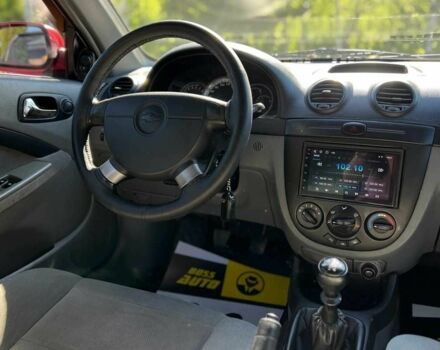 Красный Шевроле Лачетти, объемом двигателя 1.8 л и пробегом 107 тыс. км за 5400 $, фото 11 на Automoto.ua