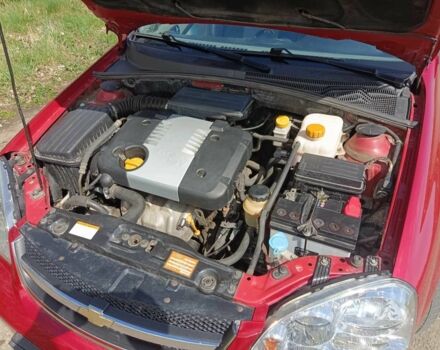 Красный Шевроле Лачетти, объемом двигателя 1.8 л и пробегом 104 тыс. км за 6100 $, фото 15 на Automoto.ua