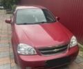 Красный Шевроле Лачетти, объемом двигателя 1.8 л и пробегом 343 тыс. км за 4300 $, фото 3 на Automoto.ua