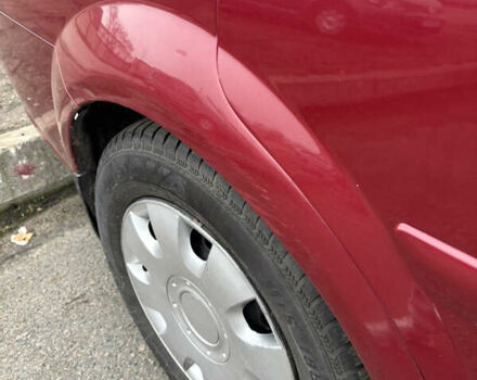 Красный Шевроле Лачетти, объемом двигателя 1.8 л и пробегом 220 тыс. км за 5600 $, фото 4 на Automoto.ua