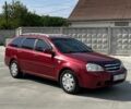 Красный Шевроле Лачетти, объемом двигателя 1.8 л и пробегом 220 тыс. км за 4500 $, фото 1 на Automoto.ua