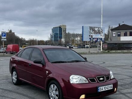 Красный Шевроле Лачетти, объемом двигателя 1.6 л и пробегом 222 тыс. км за 3999 $, фото 1 на Automoto.ua