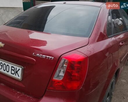 Красный Шевроле Лачетти, объемом двигателя 1.6 л и пробегом 235 тыс. км за 3100 $, фото 1 на Automoto.ua