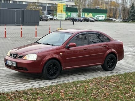 Красный Шевроле Лачетти, объемом двигателя 1.8 л и пробегом 230 тыс. км за 3550 $, фото 1 на Automoto.ua