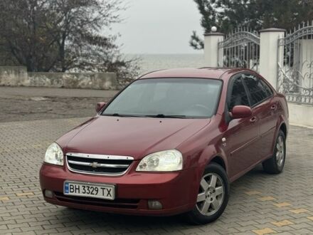 Червоний Шевроле Лачетті, об'ємом двигуна 1.8 л та пробігом 267 тис. км за 3900 $, фото 1 на Automoto.ua